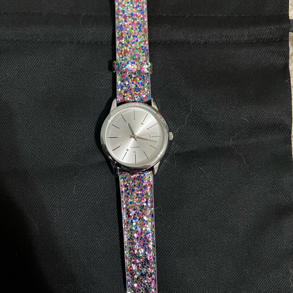 Avon Silver Watch with Multicolor Glitter Strap